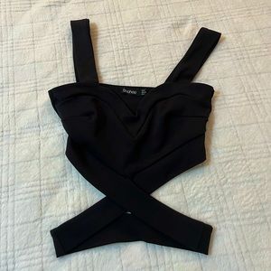 Black crisscross cropped top from boohoo,size 4